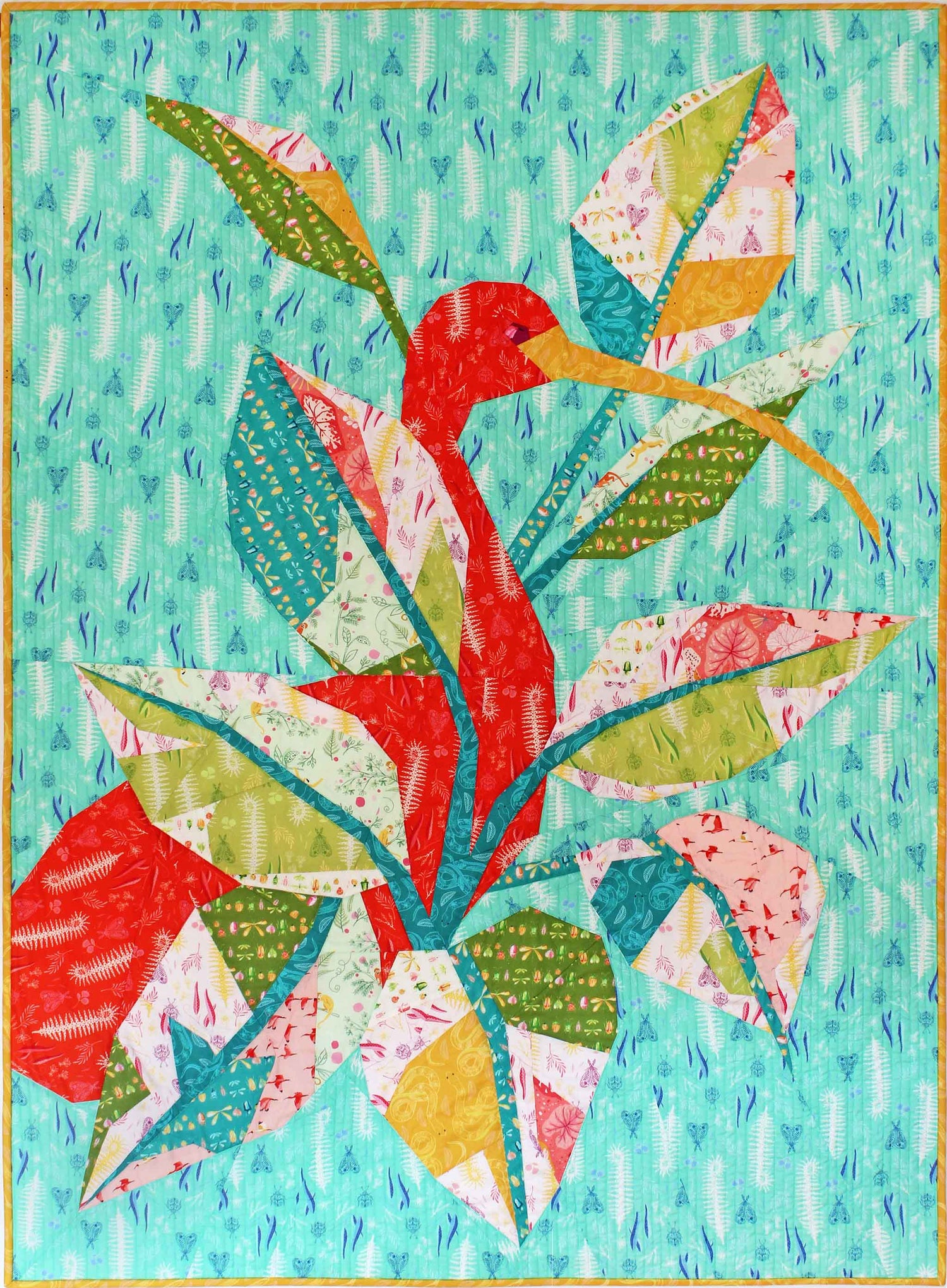 quilt of a scarlet ibis in tropical foliage on a teal ground