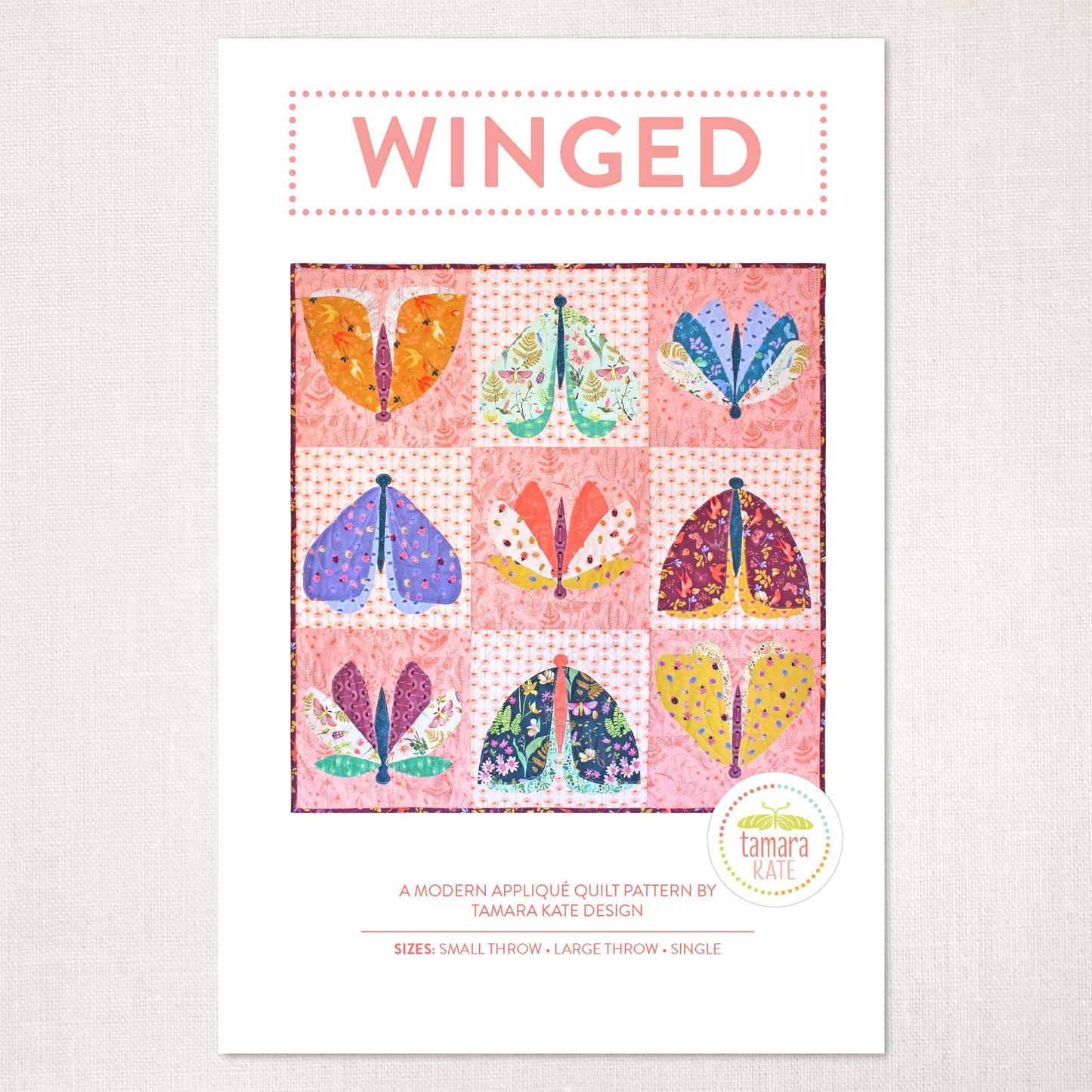 quilt pattern cover showing nine squares with large butterflies