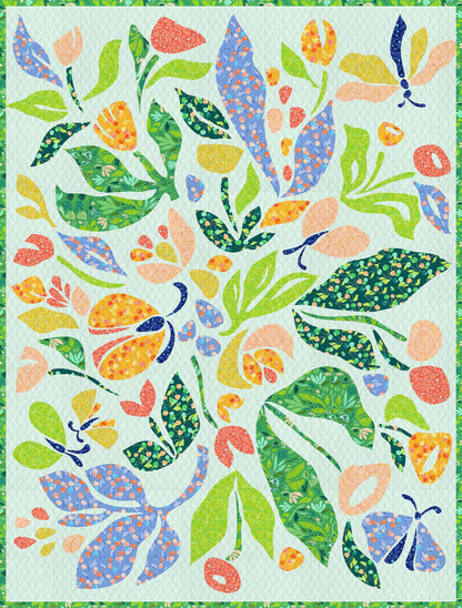 quilt of bold coloured leaves, flowers and butterflies on an aqua ground