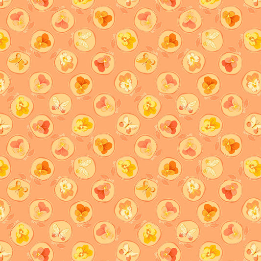 little illustrated pansies in yellows, cream and coral, each within a ring with a leaf on a soft peach ground, printed on fabric