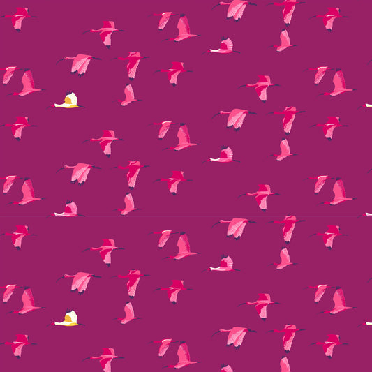 bright magenta and cream ibis flying in the same direction on a deep purple ground, printed on fabric