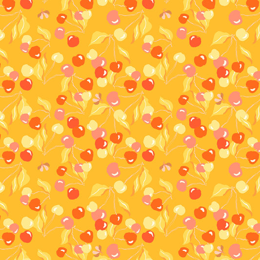 cherries and leaves in pink, yellow and coral on a gold ground, printed on fabric