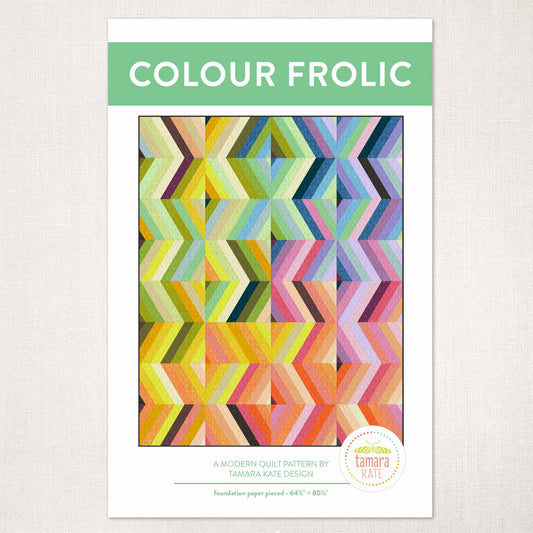 Cover of a colourful, geometric quilt pattern called Colour Frolic by Tamara Kate on a white background