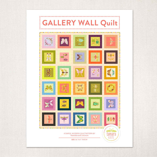 quilt pattern cover showing a quilt with large blocks of insects on coloured squares