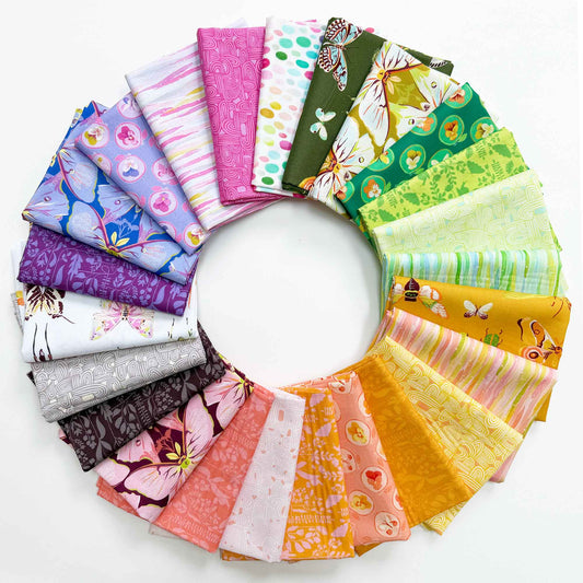 Circular arrangement of colorful fabric swatches with various patterns on a white background