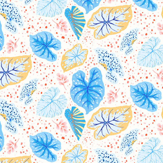 tropical leaves in blues and yellow on a creamy white ground with spots, printed on fabric