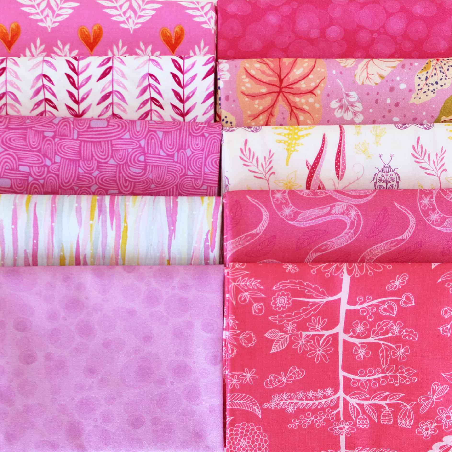 Collection of pink fabric swatches with various patterns