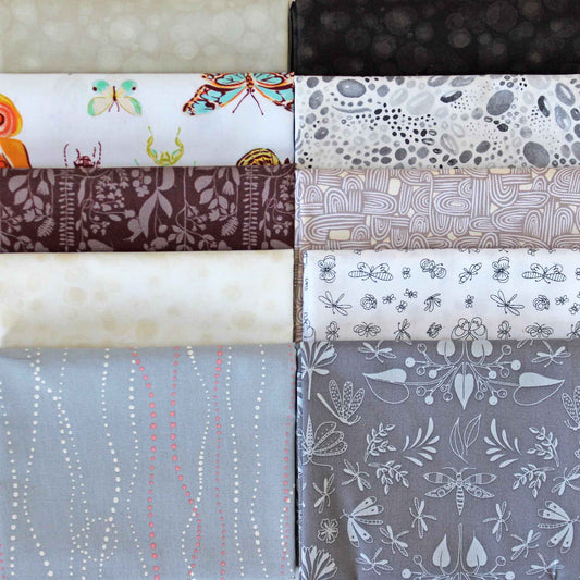 Collection of fabric swatches with various patterns in neutral colours.