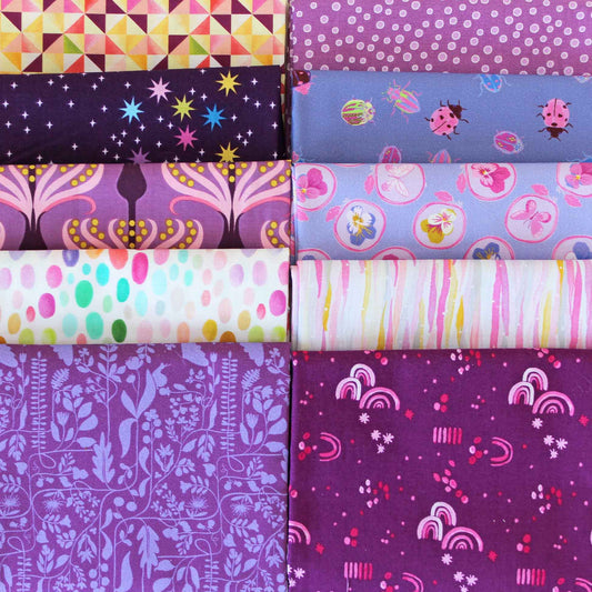 Collection of purple fabric swatches with various patterns