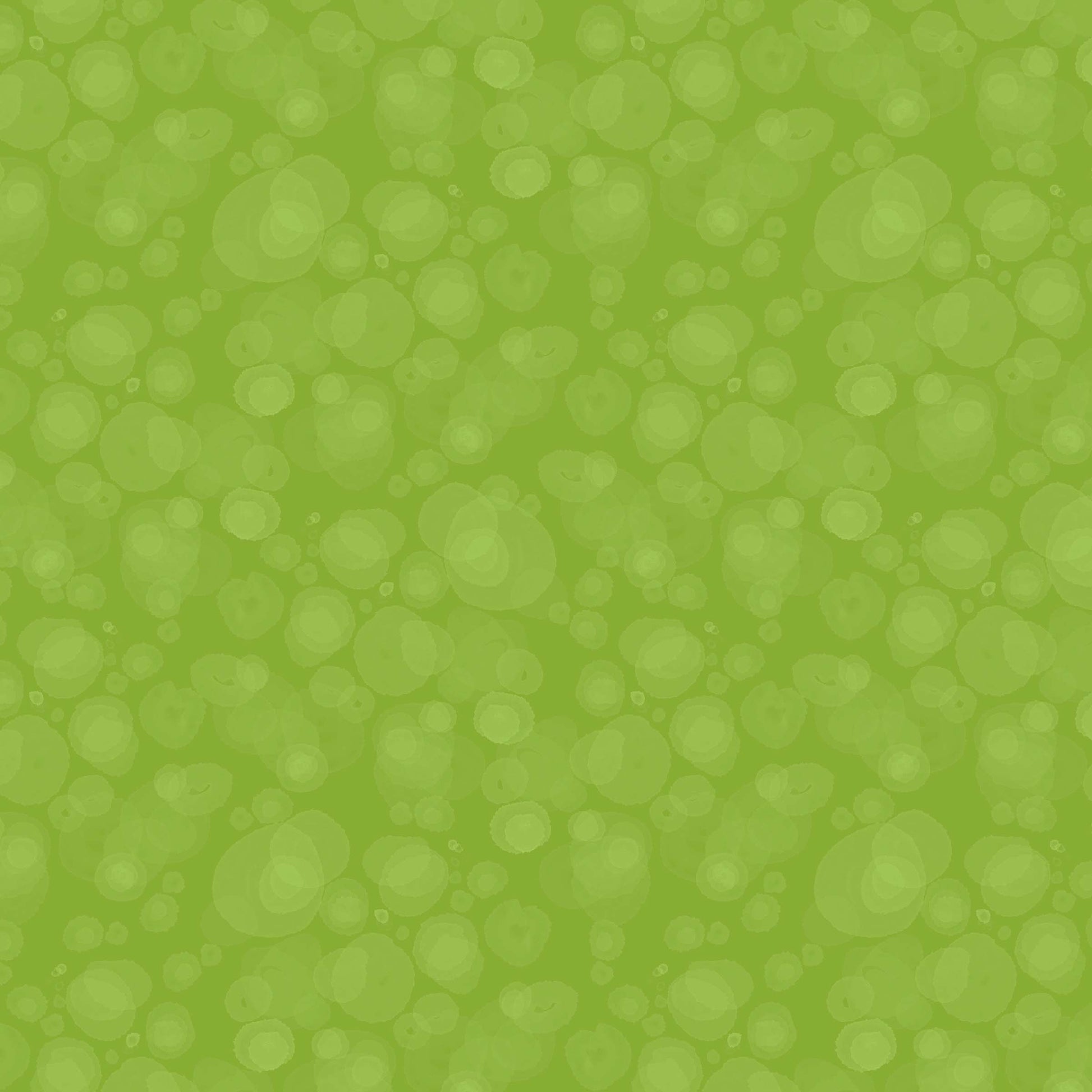 fabric with subtle watercolour spots in kelly green