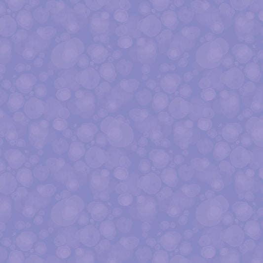 fabric with subtle watercolour spots in blueish-purple