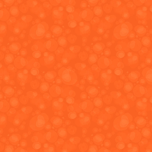 fabric with subtle watercolour spots in rich orange-red