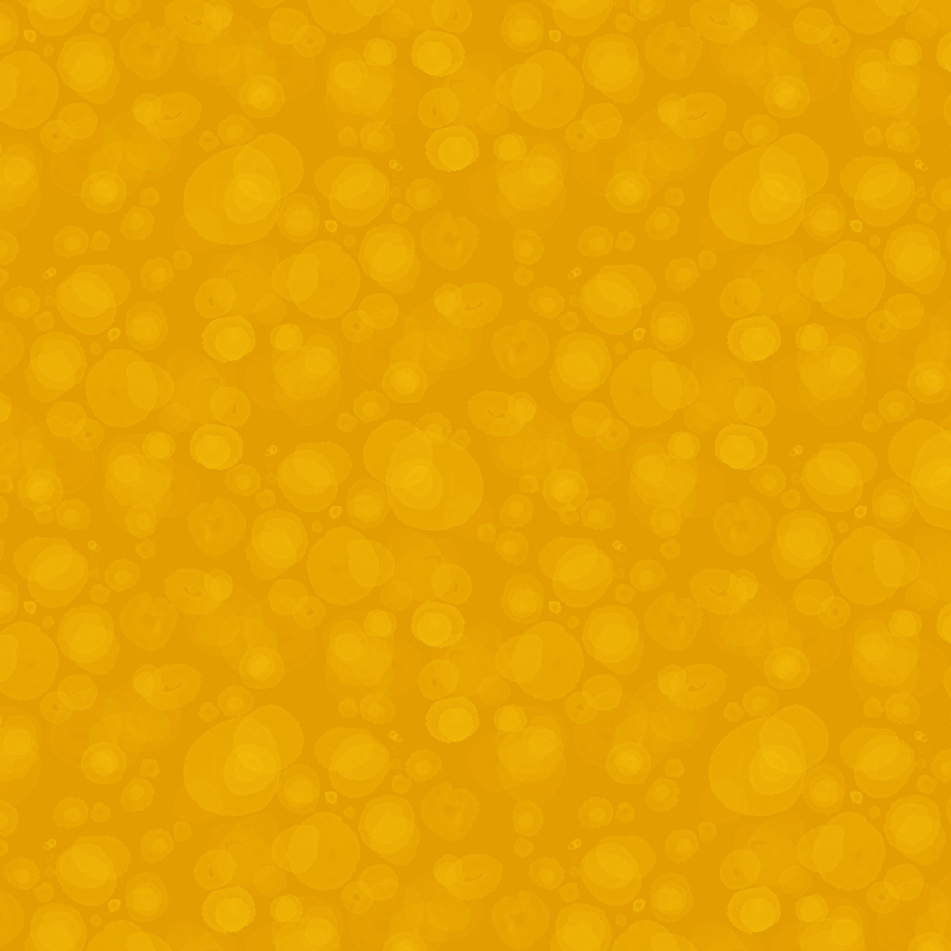 fabric with subtle watercolour spots in deep yellow-gold