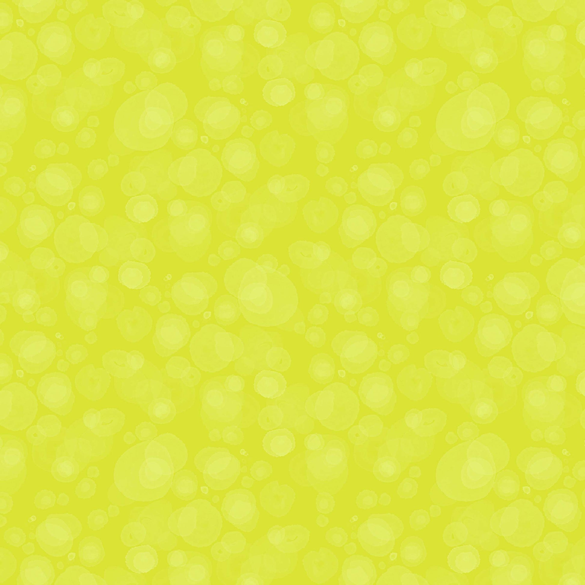 fabric with subtle watercolour spots in chartreuse-yellow