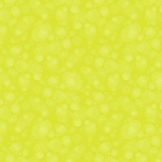 fabric with subtle watercolour spots in chartreuse-yellow
